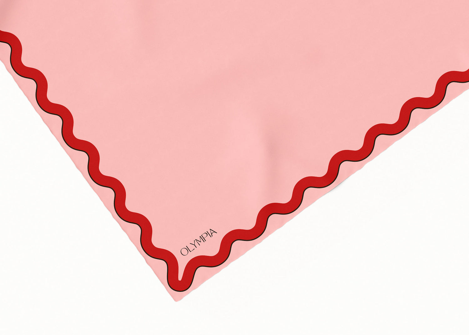 A close-up of a pink silk scarf corner, featuring a wavy red border and the brand name 'OLYMPIA' printed in dark brown near the corner.